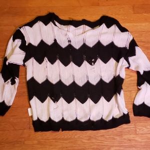 Distressed black and white stripped sweater